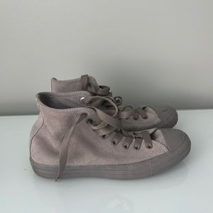 Unique pair of converse with a velvet like material. Size 9.5 in Women’s